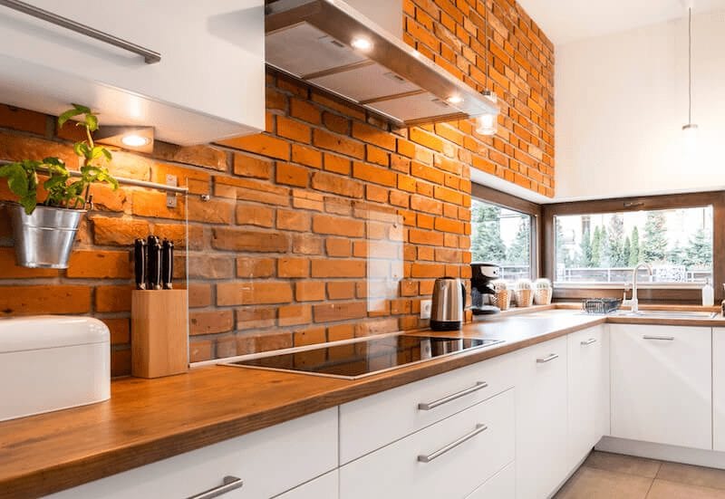 brick wall modern kitchen